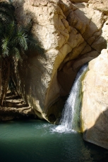 Waterfall in mountain oasis Chebika at border of Sahara, Tunisia